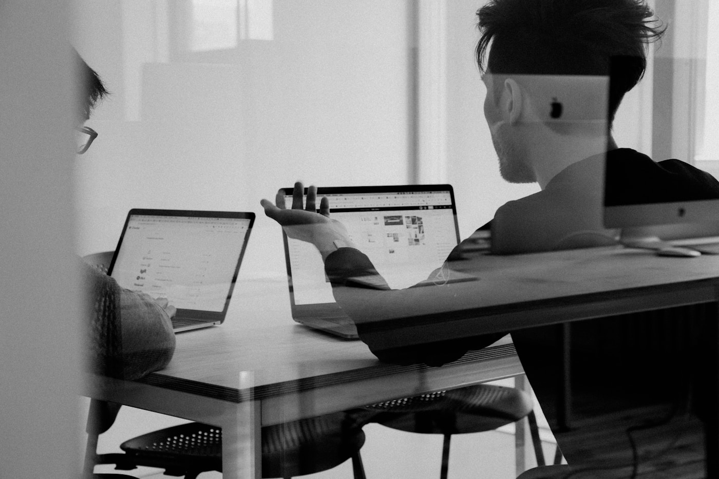 Modern executive desk with laptop and strategy notebook for B2B sales